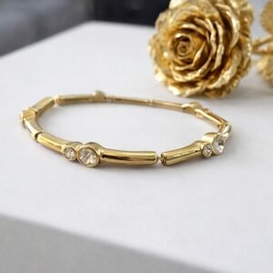Yellow gold bezel-set Chrystal Bracelet.